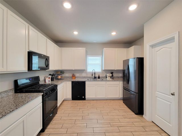 24802 Winema Woods Lane, Houston, TX 77336