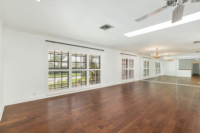 320 N Country Club Drive, Atlantis, FL 33462