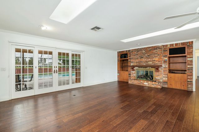 320 N Country Club Drive, Atlantis, FL 33462