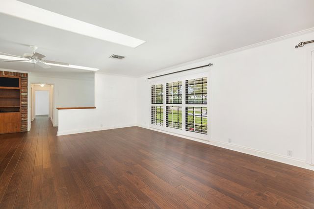 320 N Country Club Drive, Atlantis, FL 33462