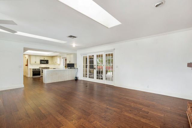 320 N Country Club Drive, Atlantis, FL 33462