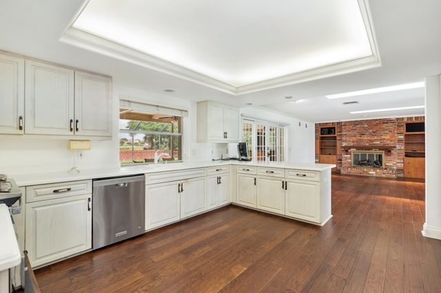 320 N Country Club Drive, Atlantis, FL 33462