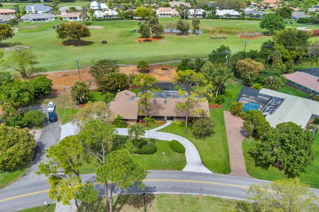 320 N Country Club Drive, Atlantis, FL 33462