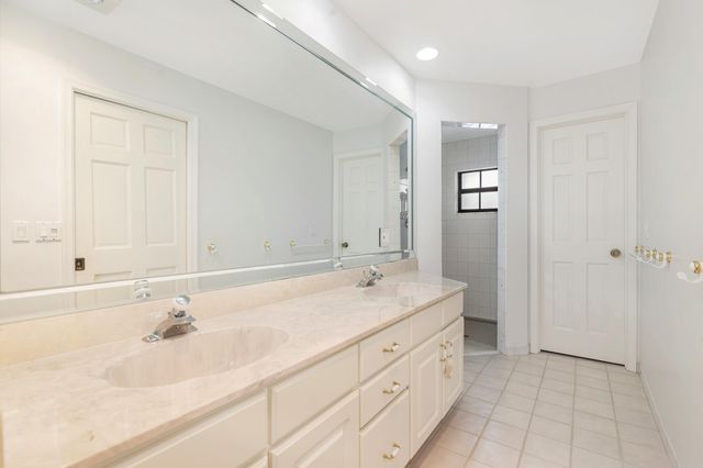 320 N Country Club Drive, Atlantis, FL 33462