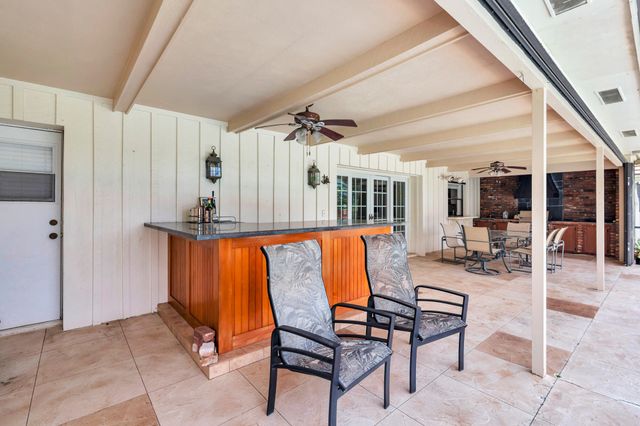 320 N Country Club Drive, Atlantis, FL 33462