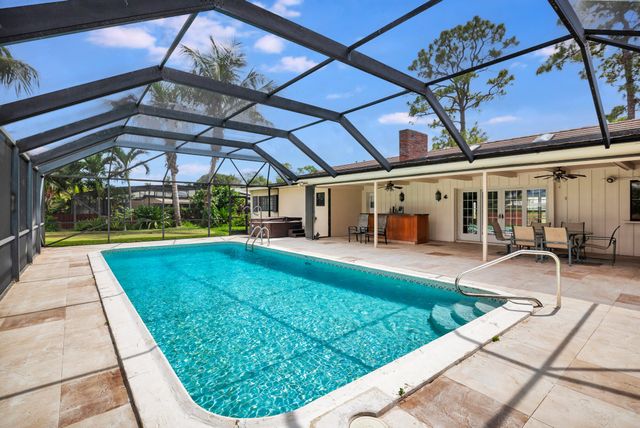 320 N Country Club Drive, Atlantis, FL 33462