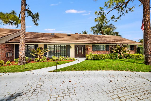 320 N Country Club Drive, Atlantis, FL 33462