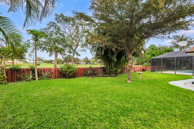 320 N Country Club Drive, Atlantis, FL 33462