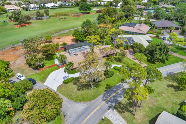 320 N Country Club Drive, Atlantis, FL 33462