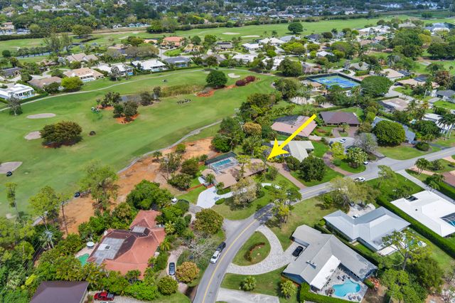 320 N Country Club Drive, Atlantis, FL 33462