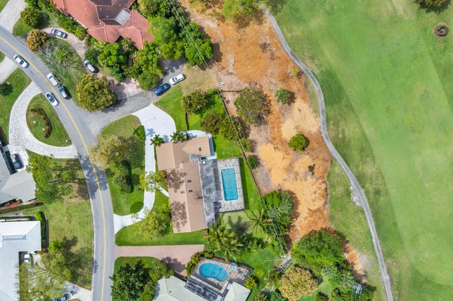 320 N Country Club Drive, Atlantis, FL 33462