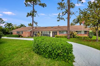 320 N Country Club Drive, Atlantis, FL 33462