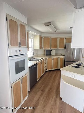 812 Oleander Circle, Barefoot Bay, FL 32976