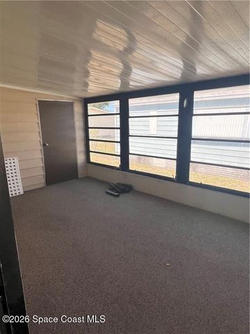 812 Oleander Circle, Barefoot Bay, FL 32976