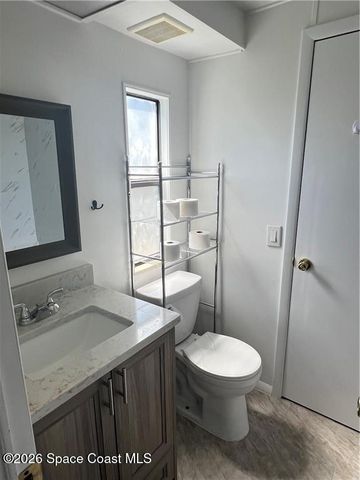 812 Oleander Circle, Barefoot Bay, FL 32976