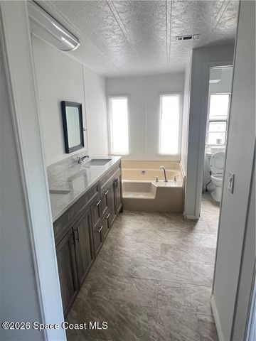 812 Oleander Circle, Barefoot Bay, FL 32976