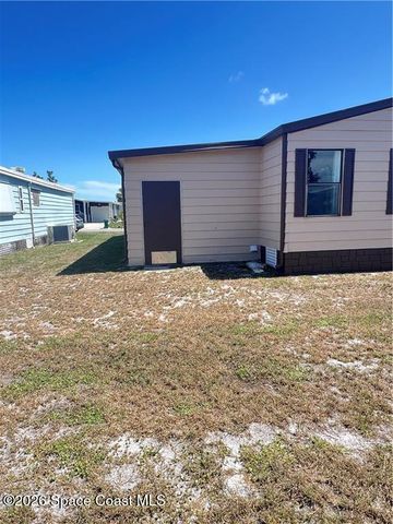 812 Oleander Circle, Barefoot Bay, FL 32976