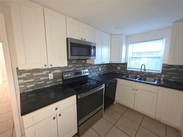 1344 WICKHAM LANE, Holiday, FL 34691