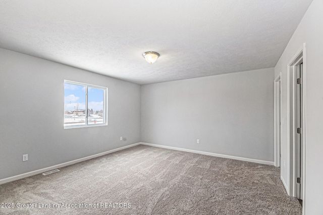 1030 Woodridge Drive, St. Johns, MI 48879