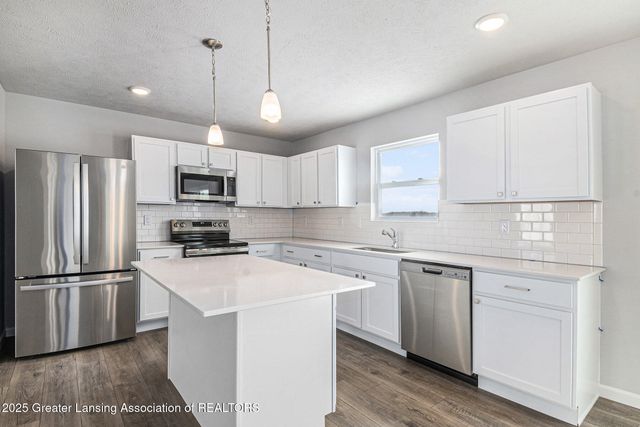 1030 Woodridge Drive, St. Johns, MI 48879