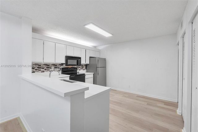 5661 Riverside Dr 103B7, Coral Springs, FL 33067