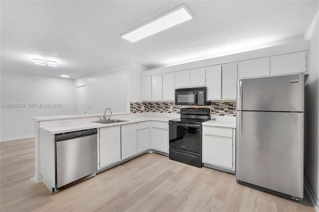 5661 Riverside Dr 103B7, Coral Springs, FL 33067