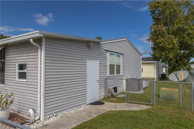 610 Wedelia Drive, Barefoot Bay, FL 32976