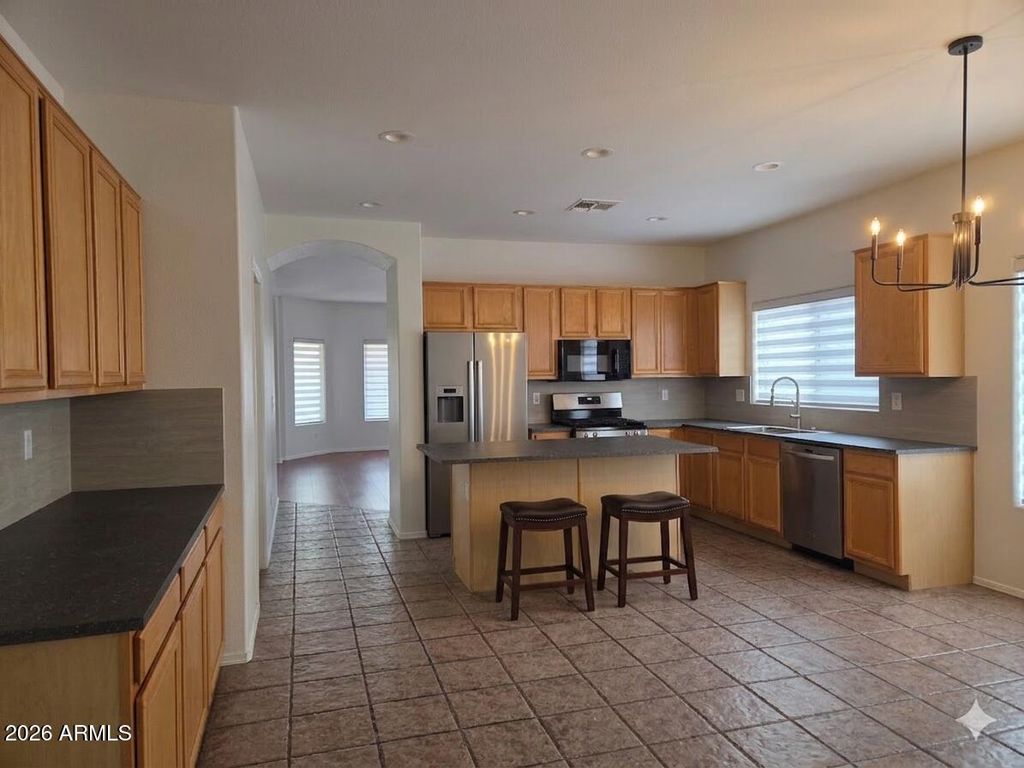 Image 5 of property listing at 14168 W FAIRMOUNT Avenue, Goodyear, AZ 85395