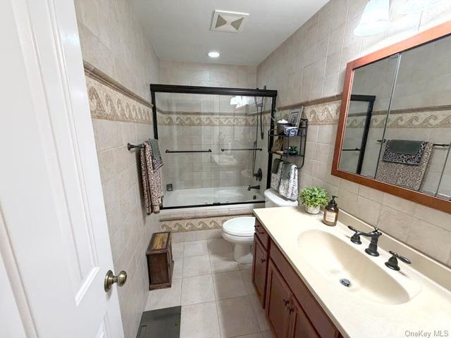 43 Grassy Pond Drive, Smithtown, NY 11787