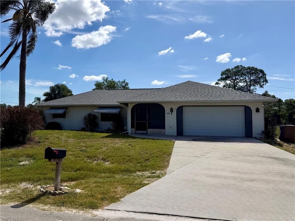 122 Roosevelt AVE, LEHIGH ACRES, FL 33936 — exterior