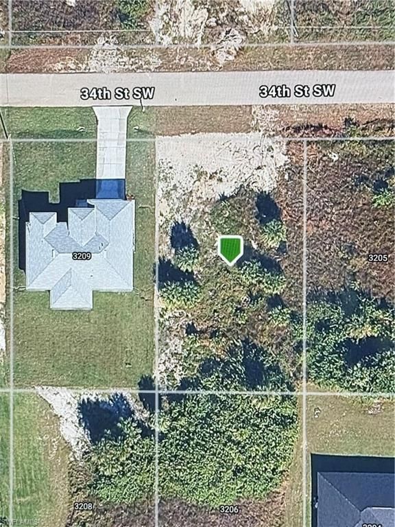3207 34th ST SW, LEHIGH ACRES, FL 33976 — exterior