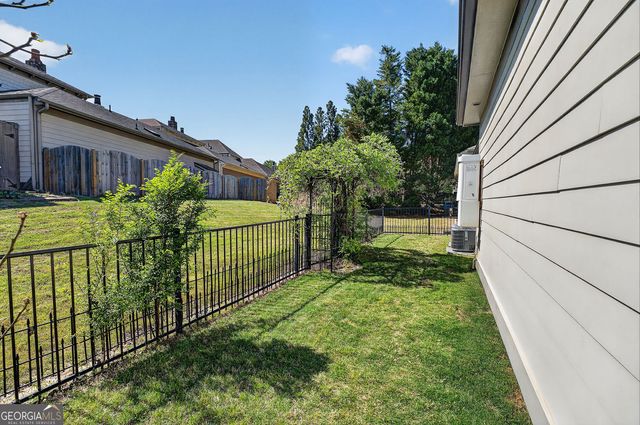 415 Falling Water Avenue, Woodstock, GA 30189