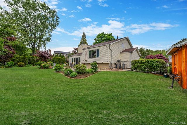 28 Manchester Boulevard, Wheatley Heights, NY 11798