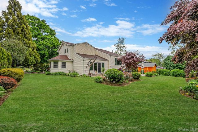 28 Manchester Boulevard, Wheatley Heights, NY 11798