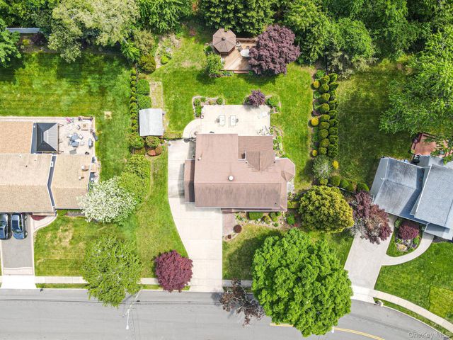 28 Manchester Boulevard, Wheatley Heights, NY 11798