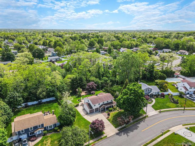 28 Manchester Boulevard, Wheatley Heights, NY 11798