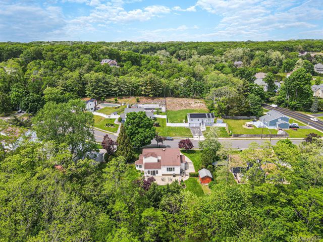 28 Manchester Boulevard, Wheatley Heights, NY 11798