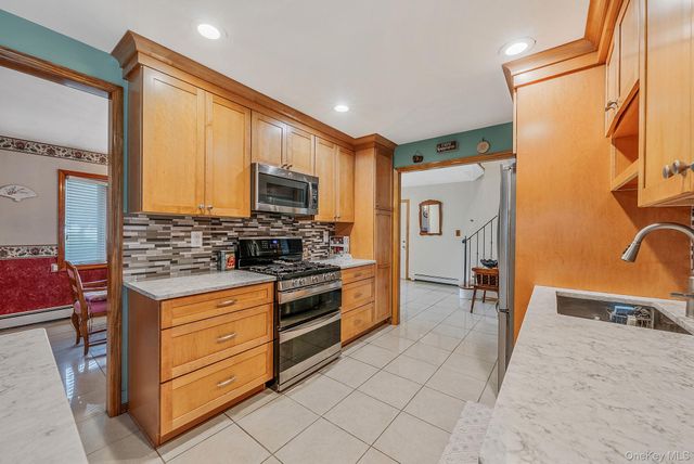28 Manchester Boulevard, Wheatley Heights, NY 11798
