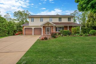 28 Manchester Boulevard, Wheatley Heights, NY 11798