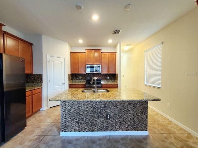 10031 NEWMINSTER LOOP, Ruskin, FL 33573