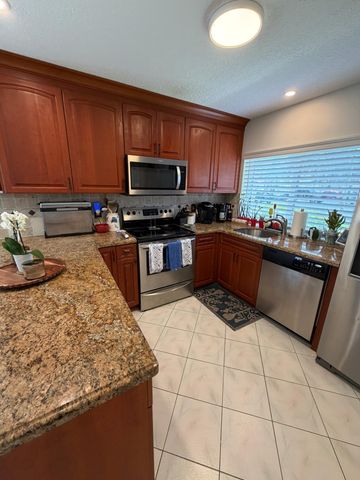 699 Deer Creek Corona Way, Deerfield Beach, FL 33442