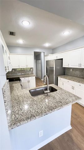 12625 NW 56th St, Coral Springs, FL 33076