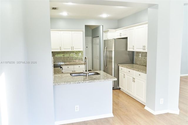 12625 NW 56th St, Coral Springs, FL 33076