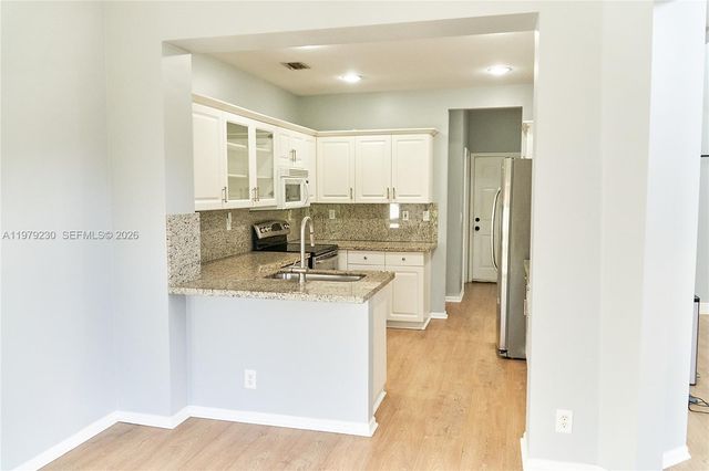 12625 NW 56th St, Coral Springs, FL 33076