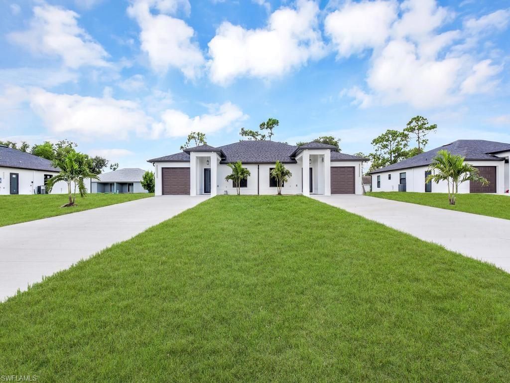 5125/5127 27TH ST SW, LEHIGH ACRES, FL 33973 — exterior