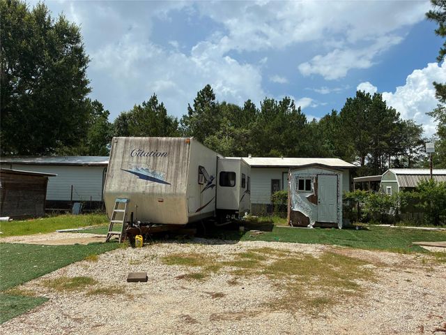 32 County Road 3405, Cleveland, TX 77327