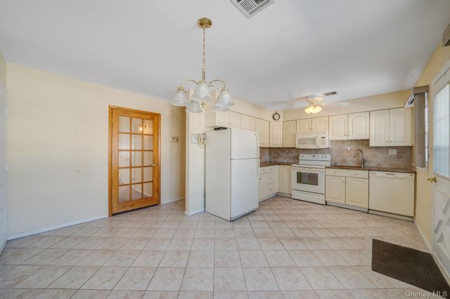 430 Falmouth Court A, Ridge, NY 11961