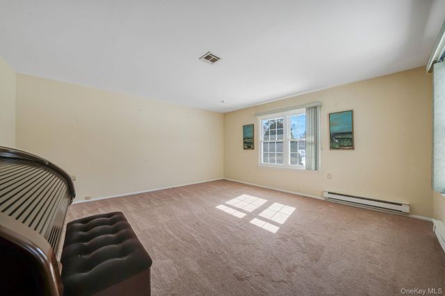 430 Falmouth Court A, Ridge, NY 11961