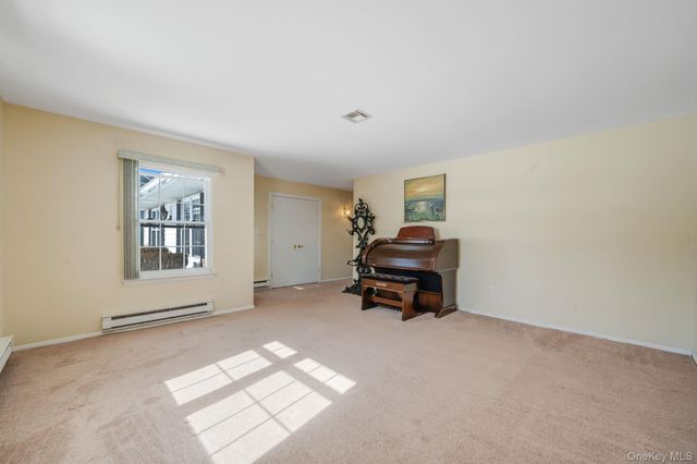 430 Falmouth Court A, Ridge, NY 11961