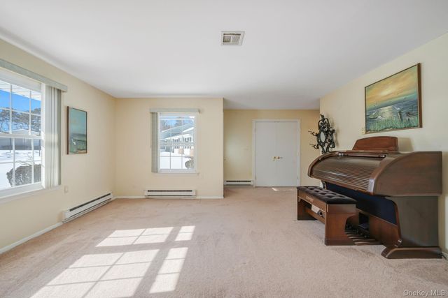 430 Falmouth Court A, Ridge, NY 11961